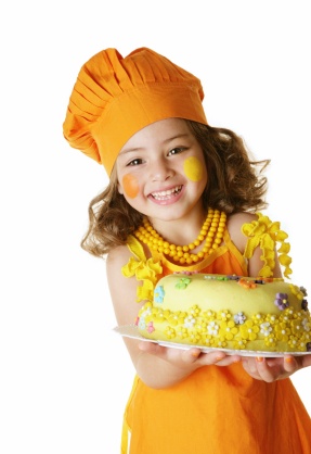 girl carrying cake