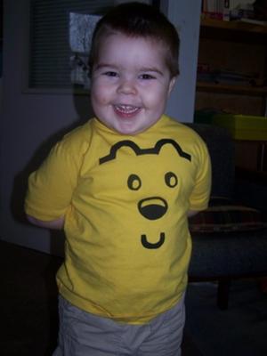 My son in his shirt that inspired the favor container!